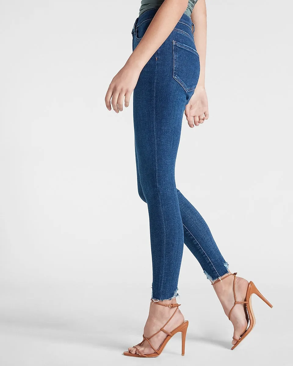 High Waisted Medium Wash Ripped Hem Skinny Jeans in Medium Wash